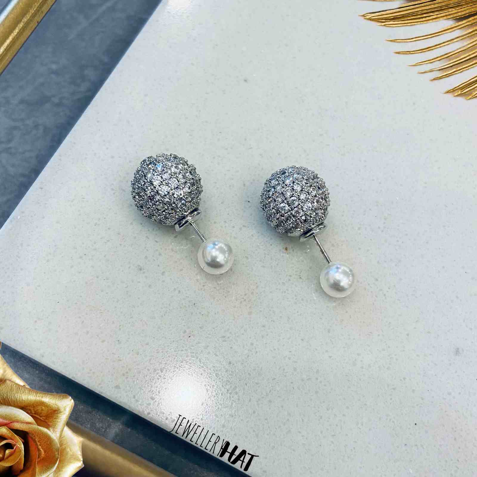 Stud Earrings in Silver